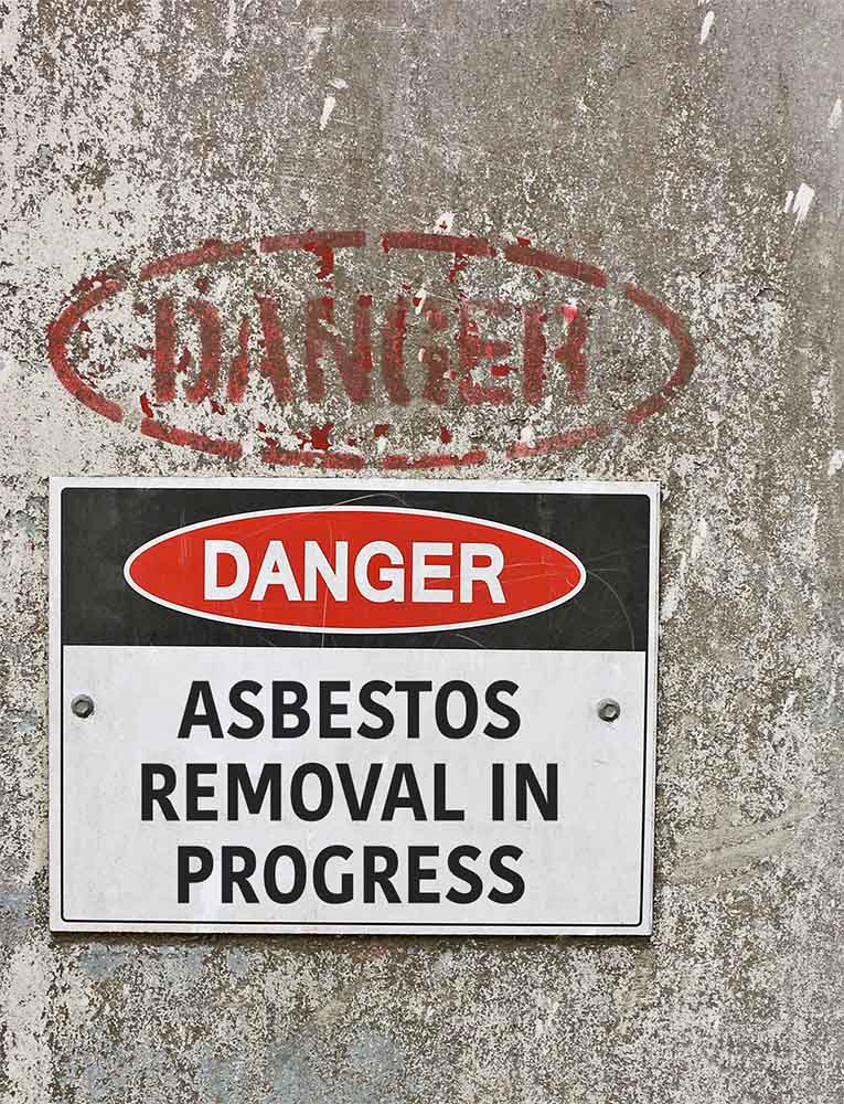 A danger sign warning of asbestos removal in progress